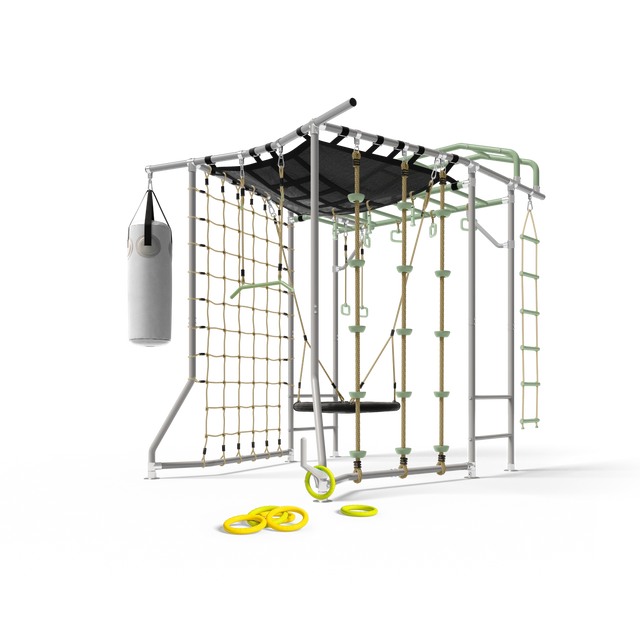 An outdoor climbing gym structure with a white metal frame, black canopy roof, green climbing holds, a beige rope net, a hanging gray punching bag, and yellow rings on the ground, isolated on a white background.