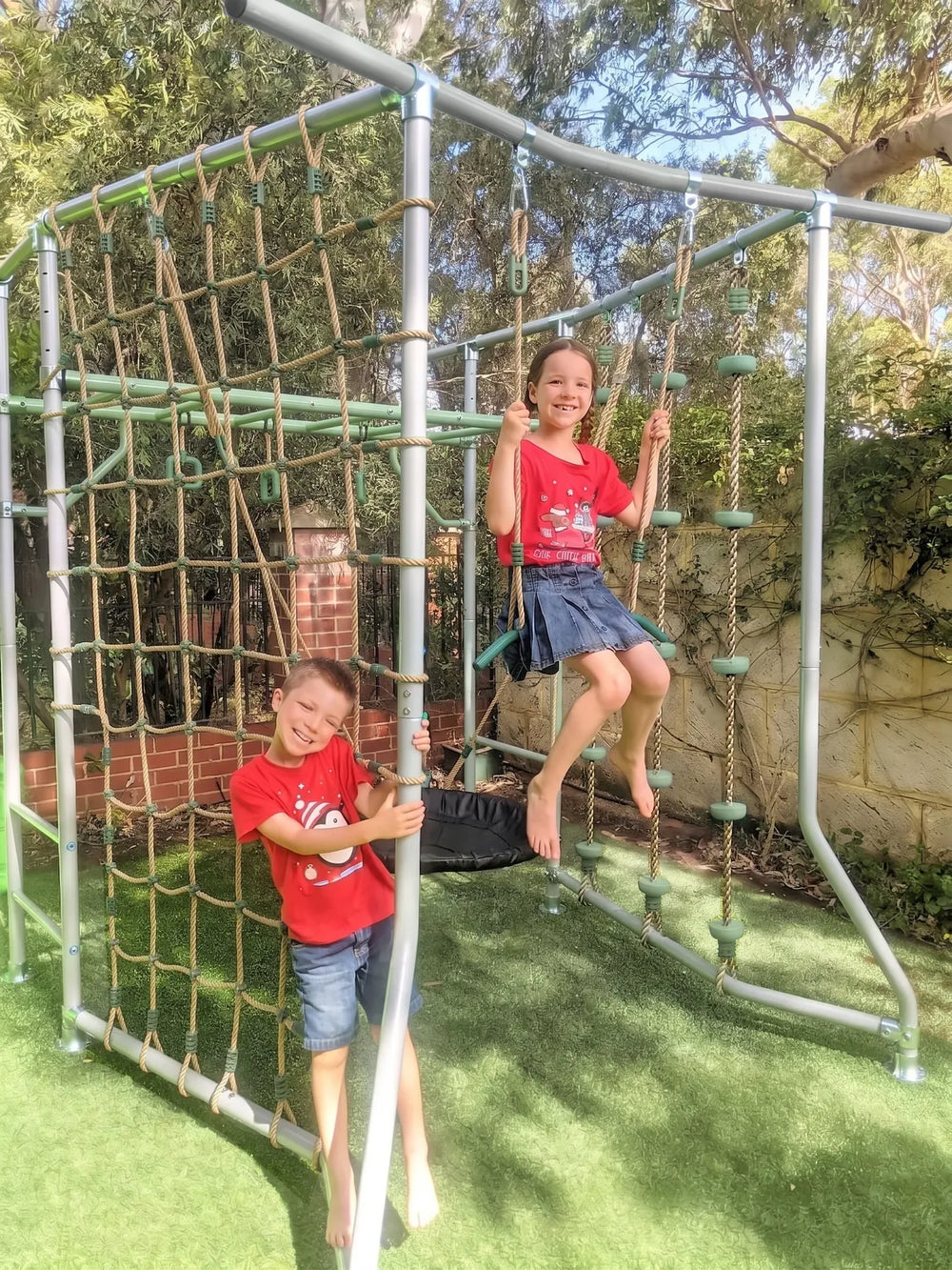Green compact outdoor playset with swings for Australian backyards