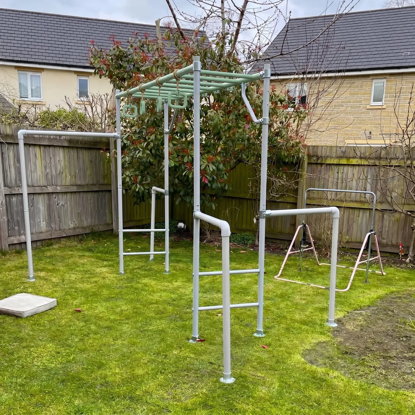 The Medium green frame customer backyard setup