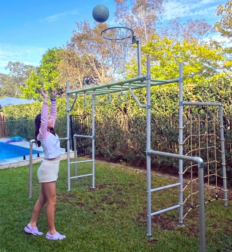 The Medium green frame in a real backyard with basketball hoop and child